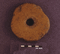 Artefact: Spindle Whorl. Material: Clay. Age: Used throughout the Ceramic Age 200AD/500AD 